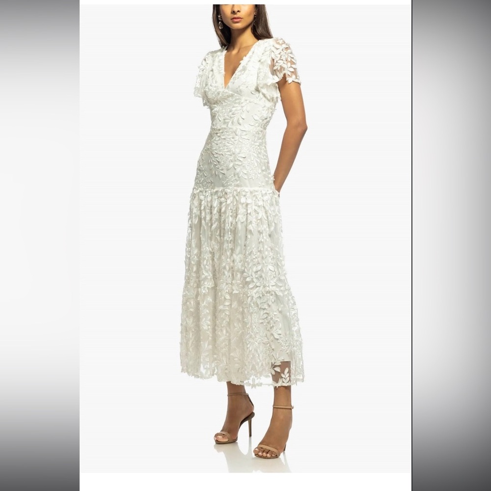 Long ivory dress with floral fil coupe